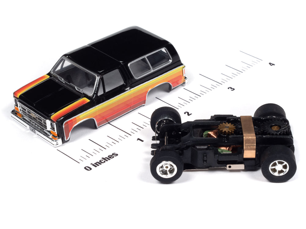 "PRE-ORDER" Auto World Xtraction 1979 Chevy Blazer - Black w/ Red & Yellow Side Panels HO Scale Slot Car (DUE OCTOBER 2024)